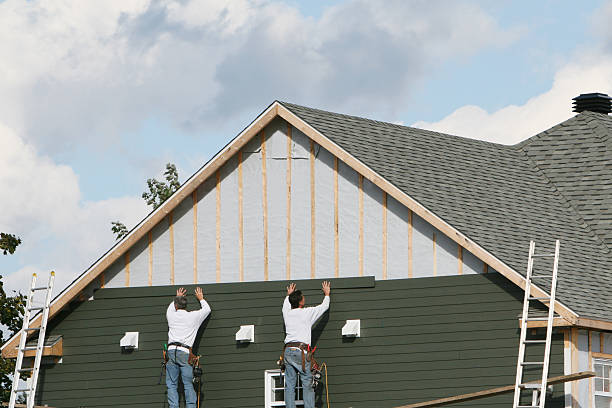 Professional Siding technician working in Dorset, OH
